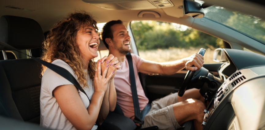 people in a car driving